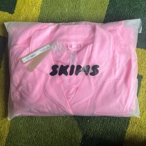 Skims pajama set in bubblegum pink; size medium; NWT and unopened